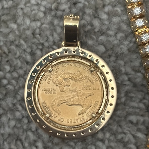 Rolex 41mm date just
Liberty 1/2 ounce 5ct diamond bezel
81 gram diamond chain - Picture 13 of 14